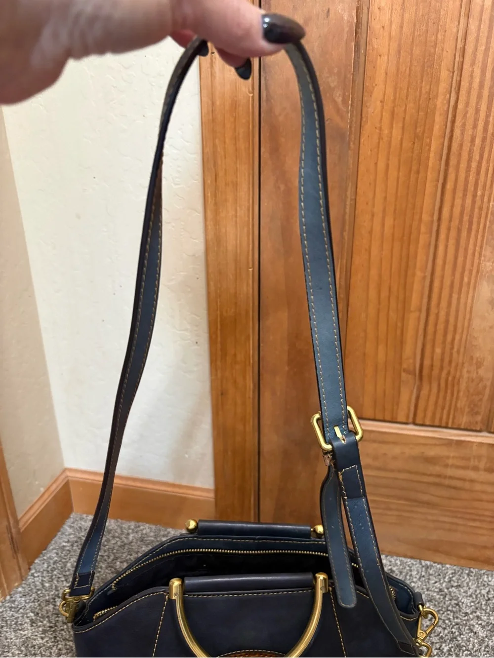 Source Unknown Black Leather Shoulder Bag with Gold Embossed Medallion